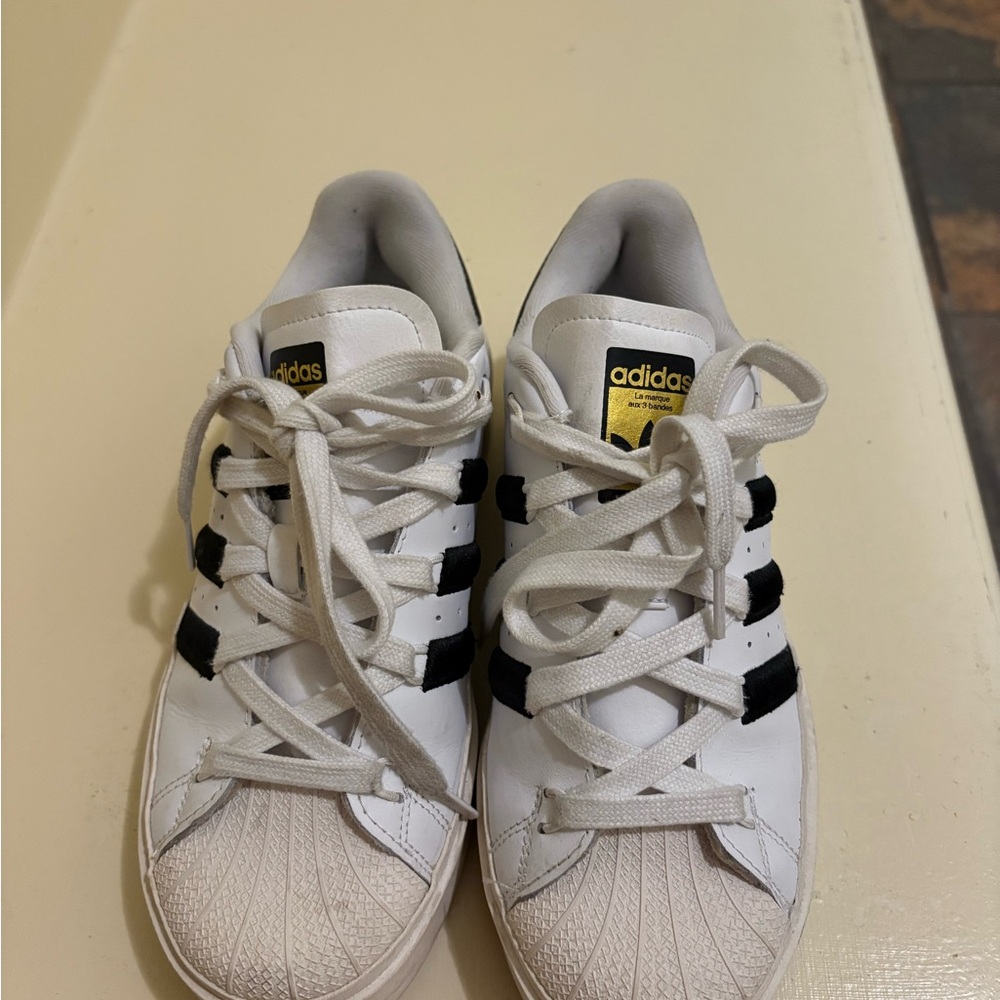 Adidas Kids White Sneakers with Black Stripes